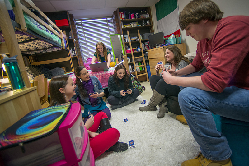 Students playing board games in dorm