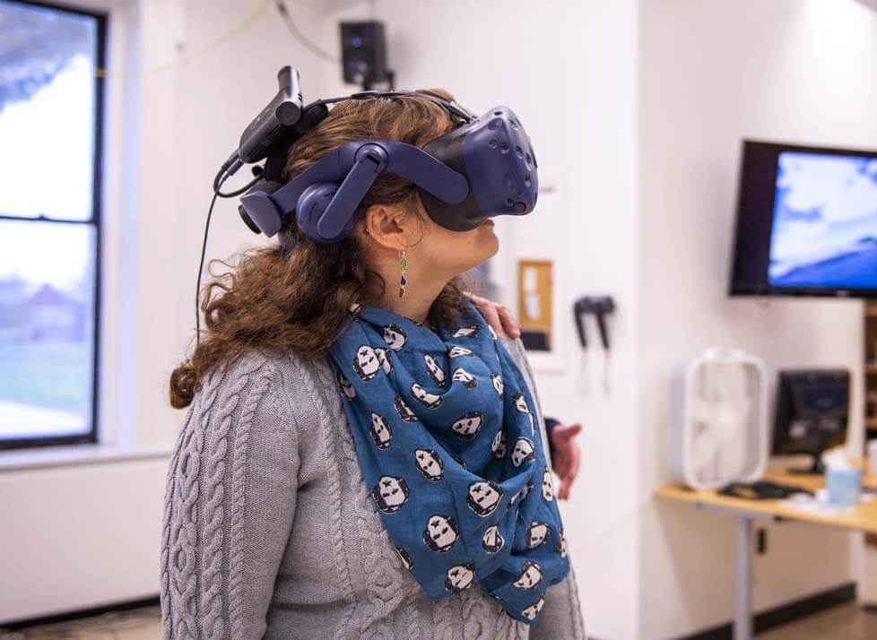 A photo of someone wearing a virtual reality headset