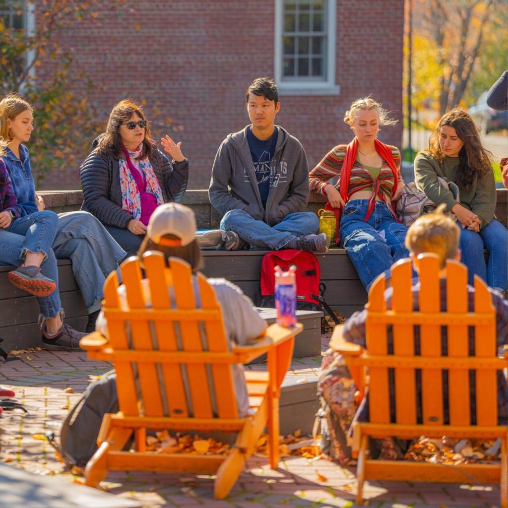 A photo of Honors College students in an outdoor classroom